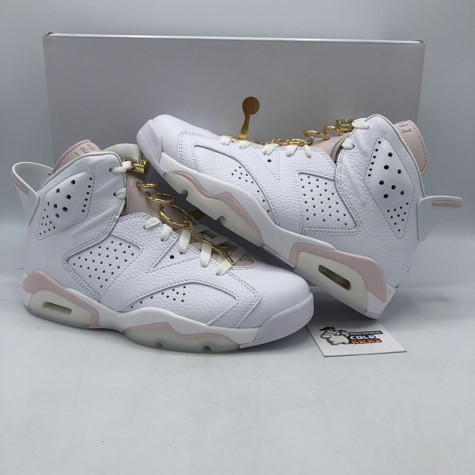 jordan 6s gold and white
