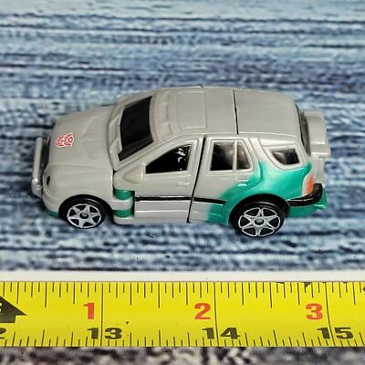 Transformers Universe Robots In Disguise X-Brawn Spychangers gray/green incomple