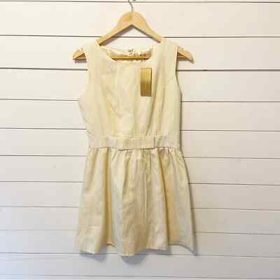NWTs Francesca s | Ivory/Gold Sparkle Fit and Flare Mini Dress with bow Medium