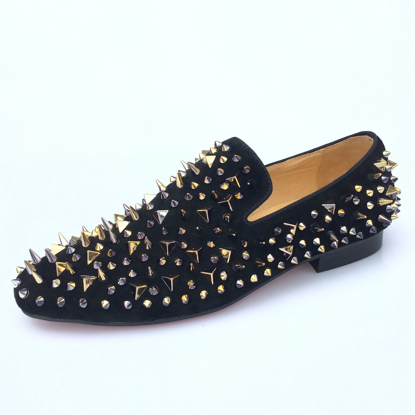 black loafers with gold spikes