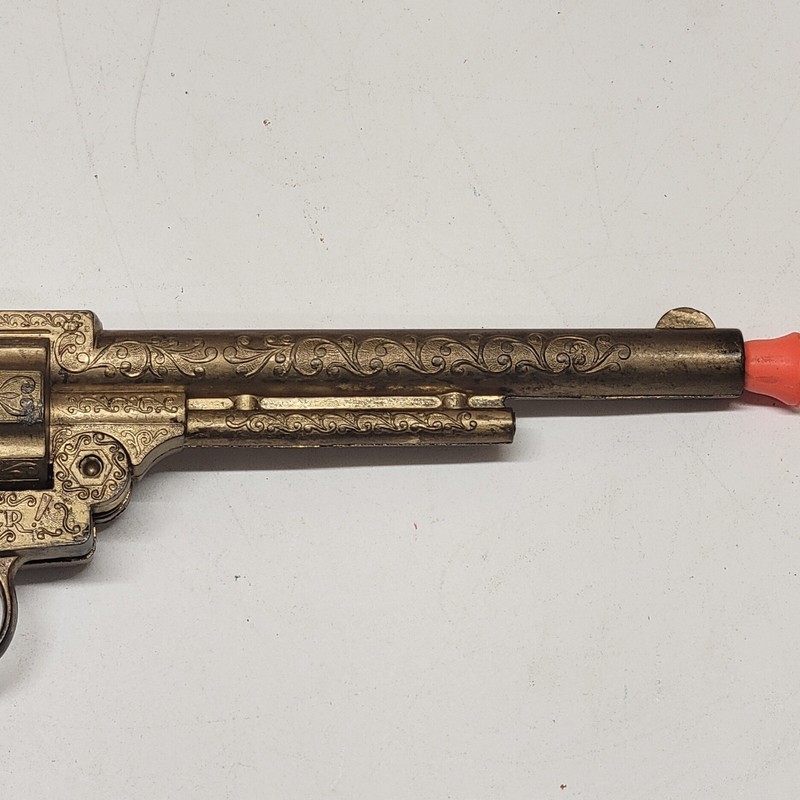 Very Rare Lone Star Night Rider Cap Gun In Gold With Red Grips