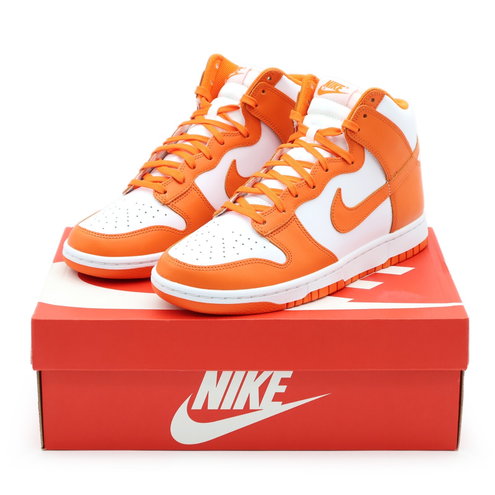 orange and white nike