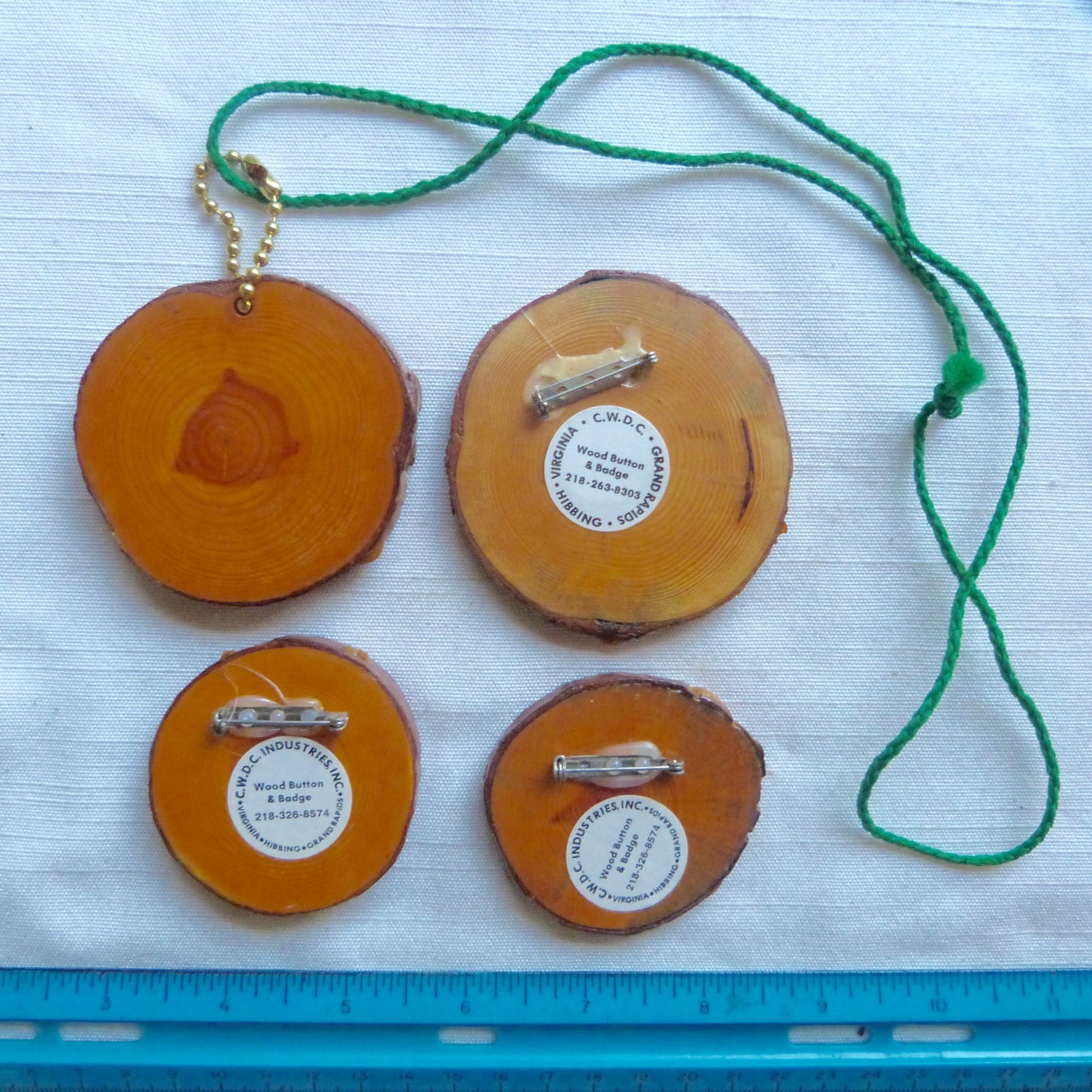 Lot of 4 Grand Rapids Minnesota wooden pinback buttons - MN