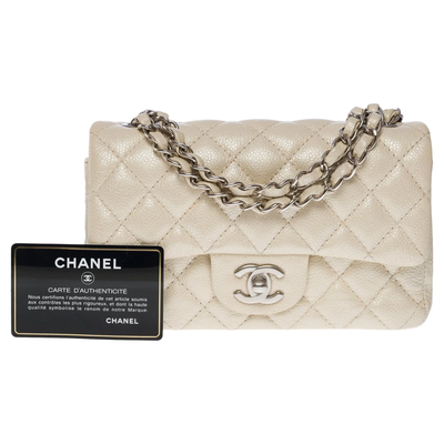 CHANEL Splendid Timeless Mini Flap bag in off white pearl quilted