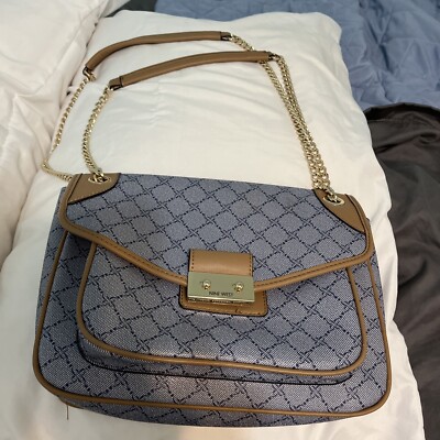 nine west handbag blue, spacious pockets ,tan inside, excellent condition