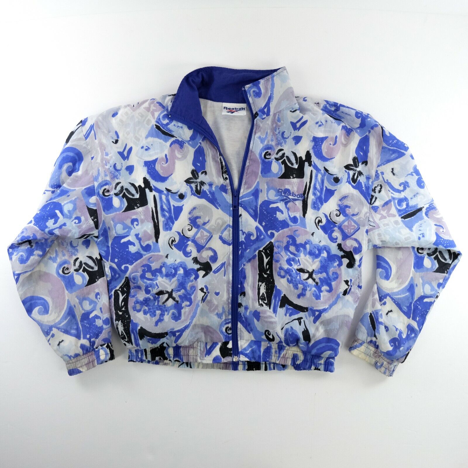 Vintage 90's Reebok Sz. Small Nylon Windbreaker All Over Vintage 90's Reebok Sz. Small Nylon Windbreaker All Over