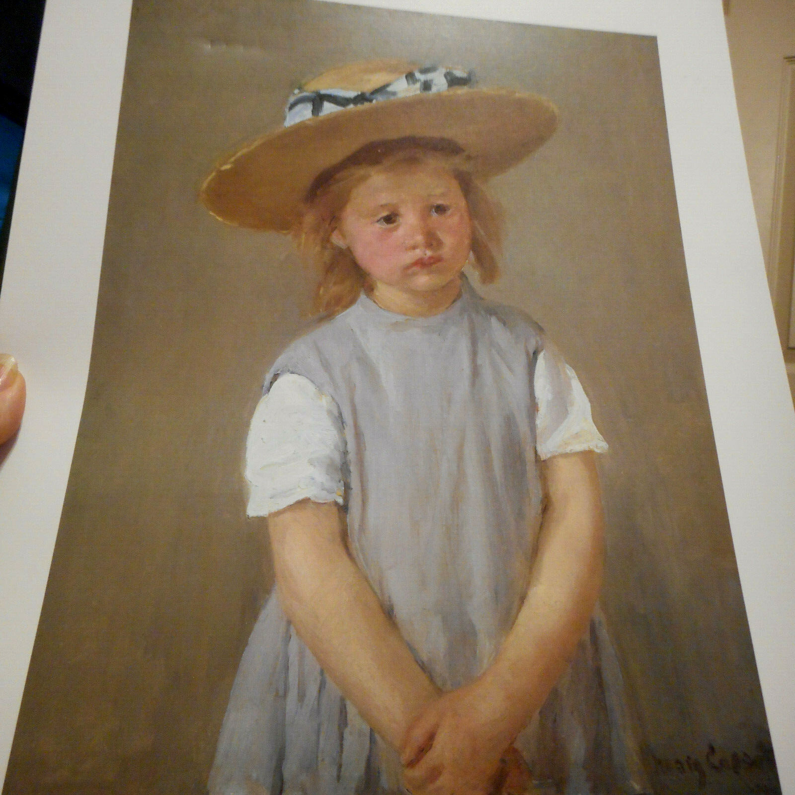 お杉わらべ a child wearing a straw  hat お杉わらべ a child wearing a straw snow hat