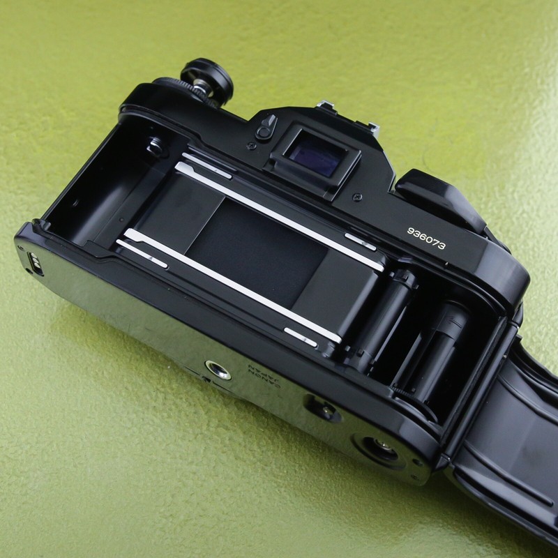 Canon A-1 camera body, A1 black 35 mm SLR Japan, power winder