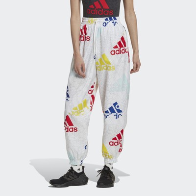 

Брюки свободного кроя из тканого материала с разноцветным логотипом Essentials, White / multicolor / vivid red
