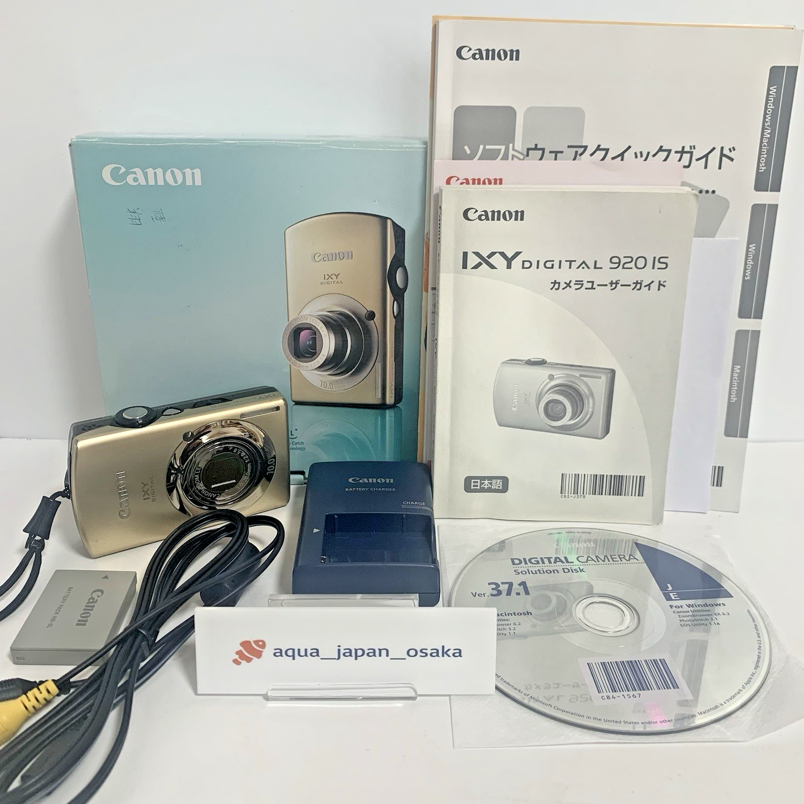 Canon IXY DIGITAL 920 IS gold digital camera w/accessories