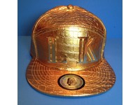 gold bucket hat tyga
