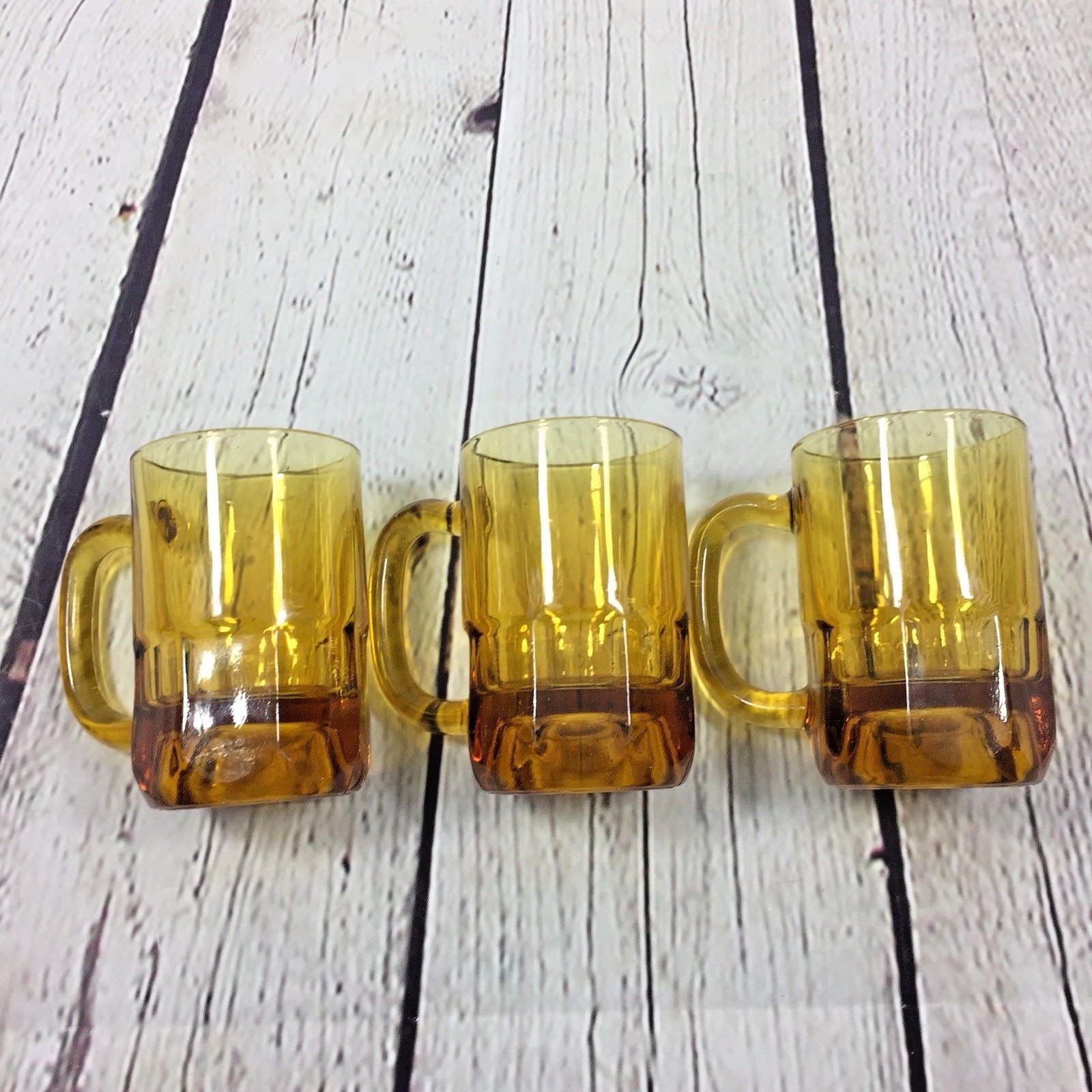 Three Vintage Amber Glass Drinking Beer Mugs