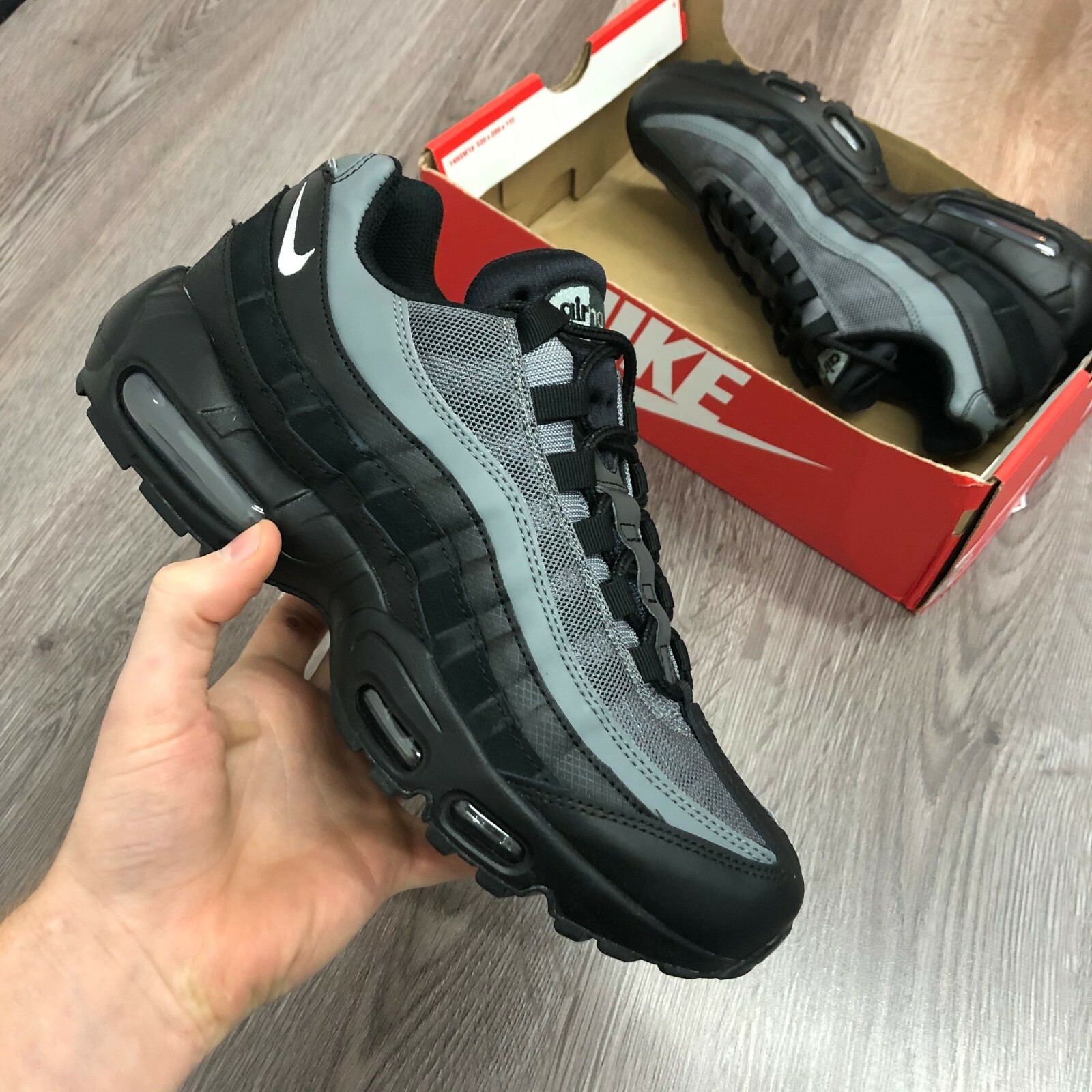 nike black and tan trainers