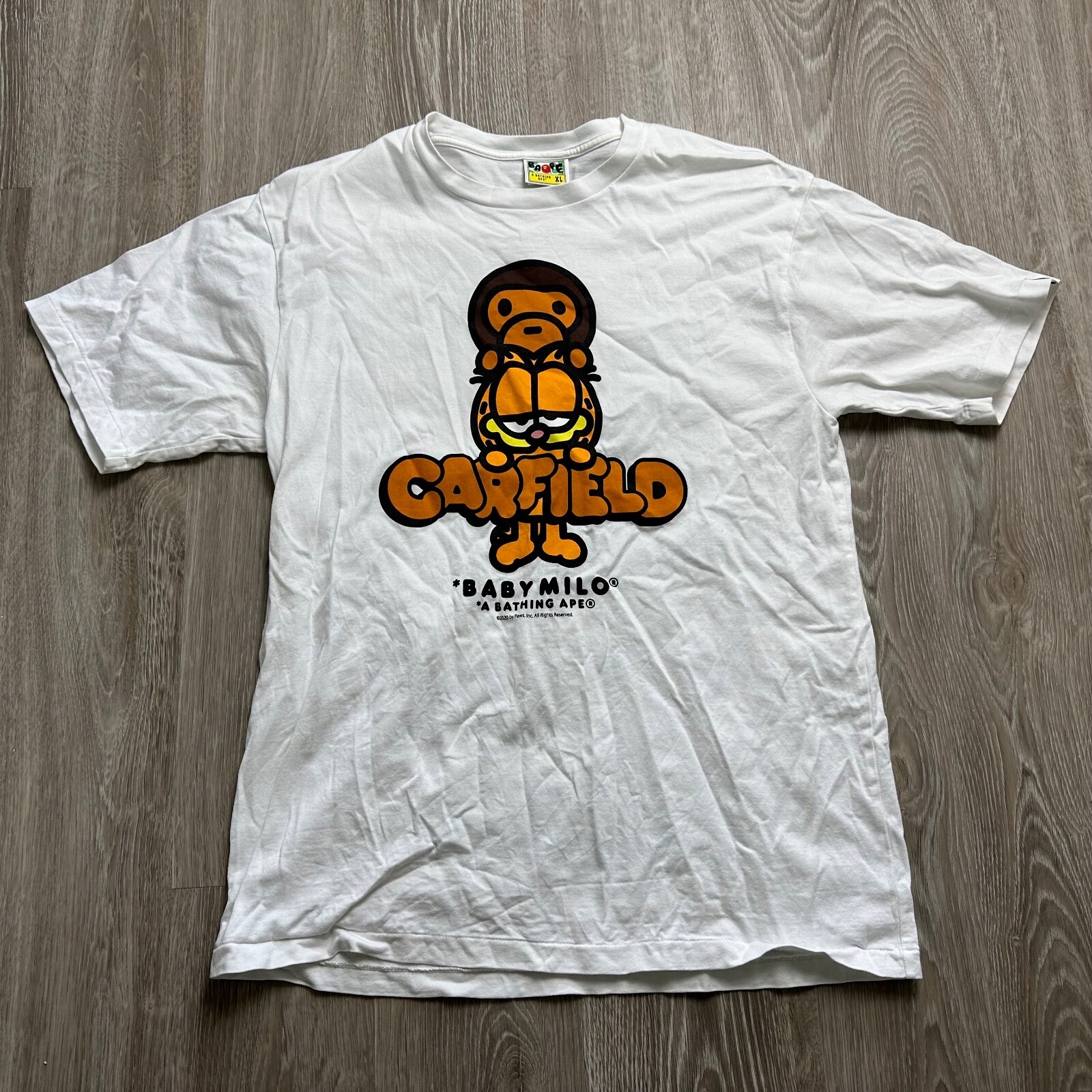 

Мужская футболка A Bathing Ape Bape Garfield Baby Milo 02, белая, оранжевая, черная, Белый