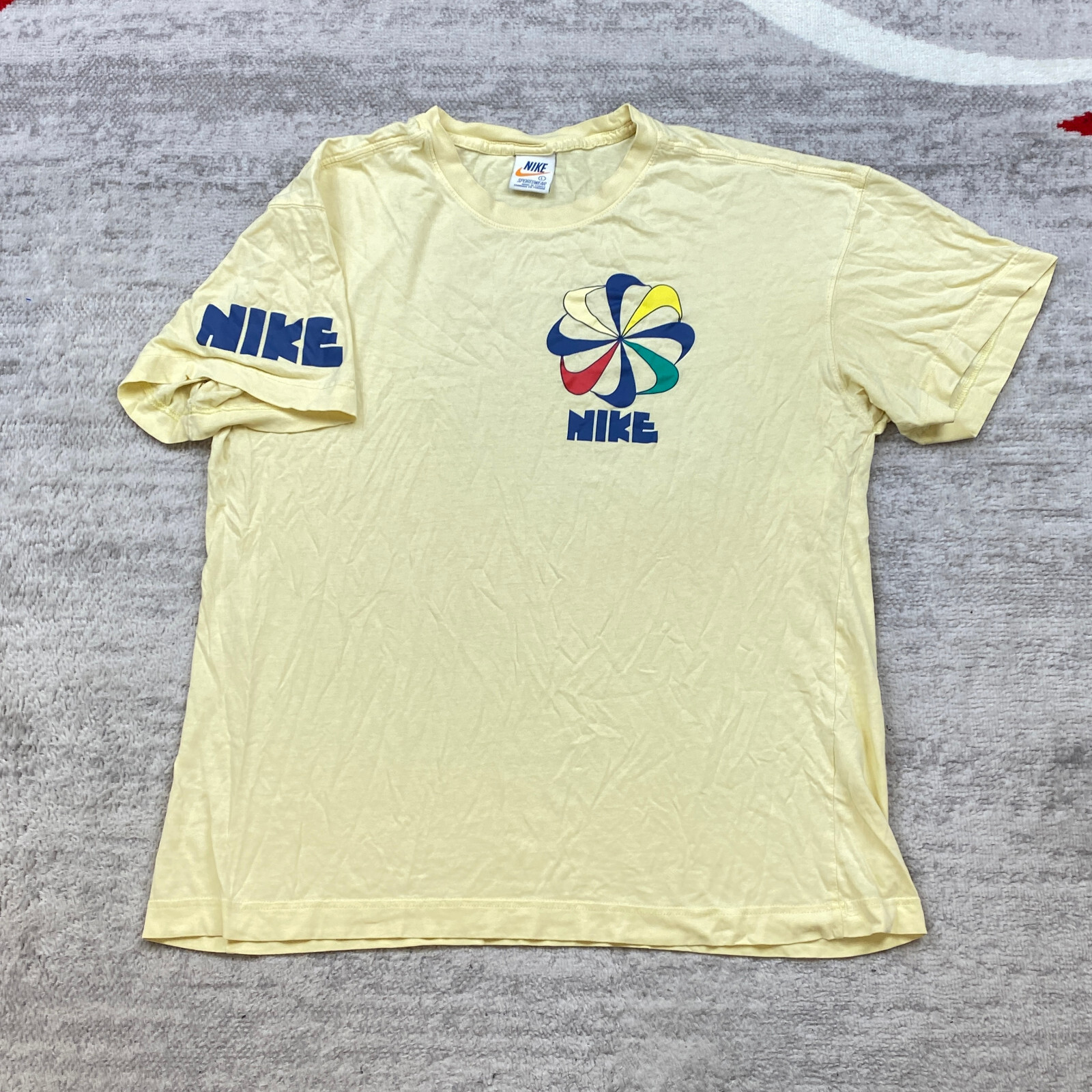 vintage nike リメイク 刺繍Tシャツ Vintage Nike Pinwheel Shirt Large Yellow Blue Spellout