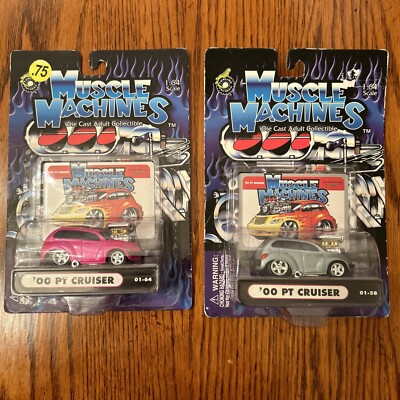 2 - Muscle Machines  00 PT Cruiser 01-58/pink + 01-58/Gray NIB Blister Pack 1:64