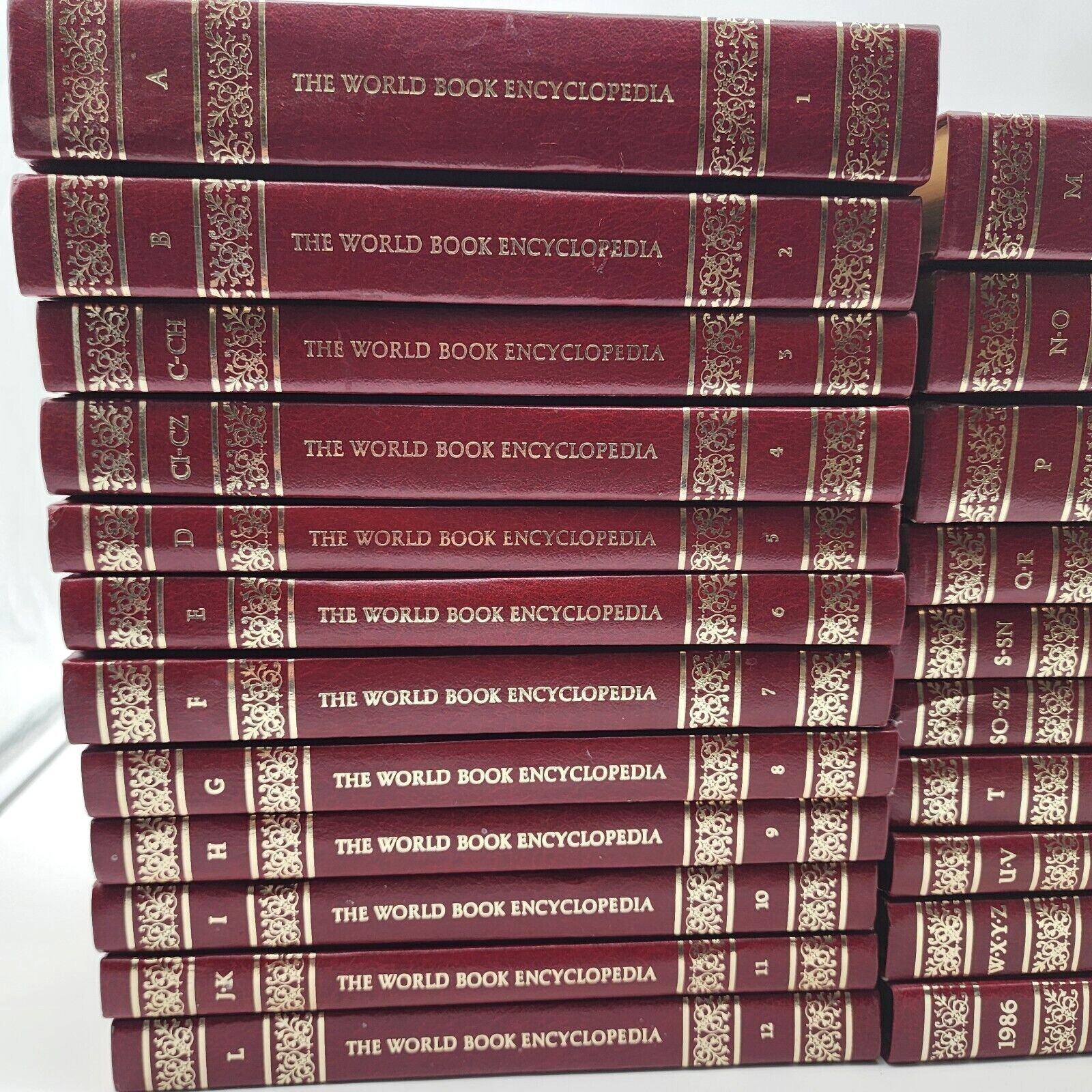 The World Book Encyclopedia copyright 1985 red gold color The World Book Encyclopedia copyright 1985 red gold color