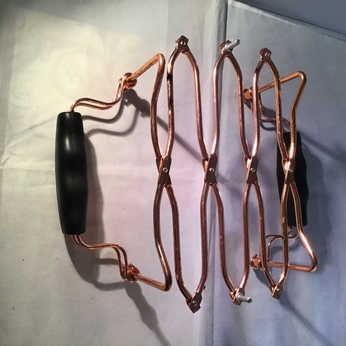 Revere Ware Copper Plated Expandable Trivet for Corning Casserole Dishes.