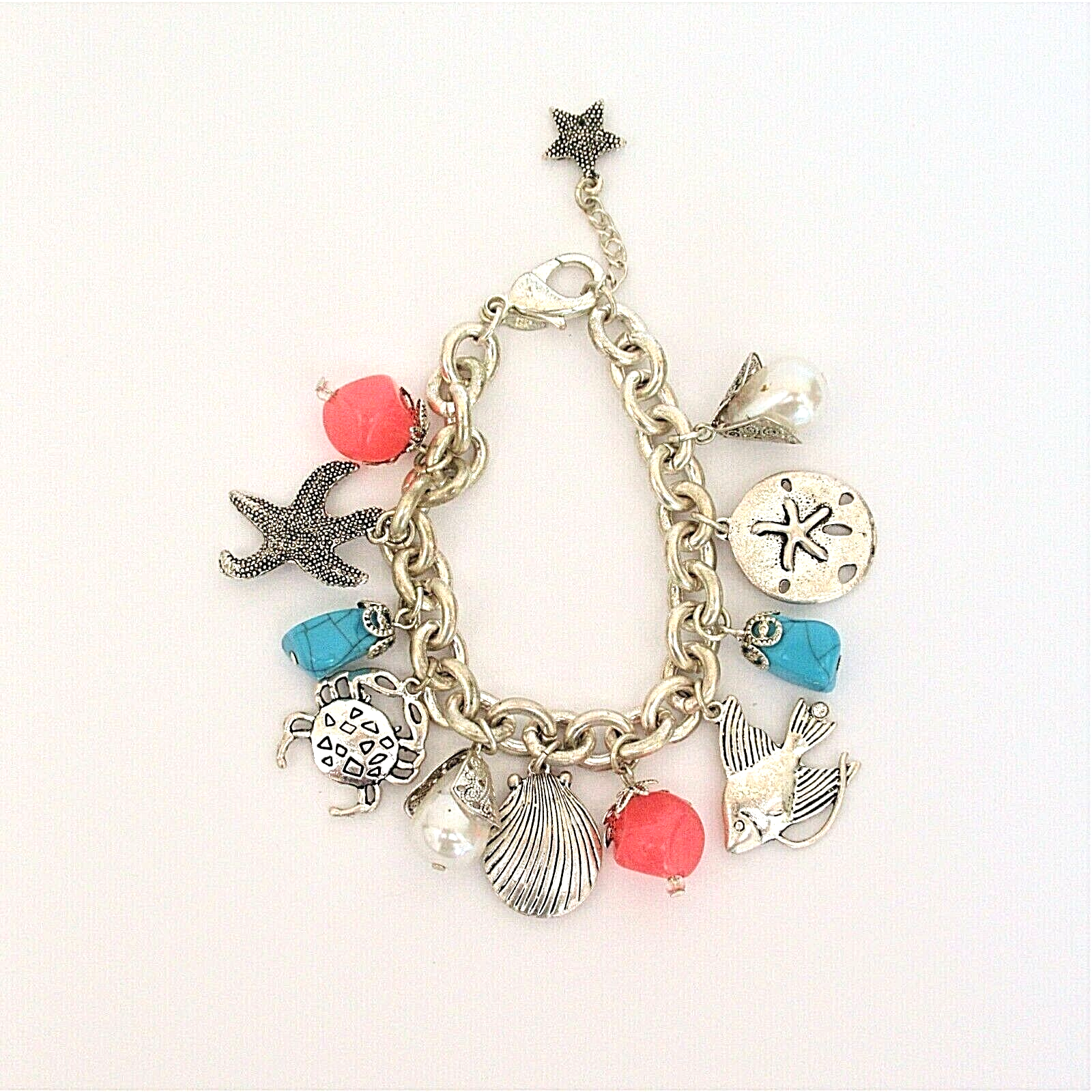 Avon silver plated ocean themed charm bracelet sea beach