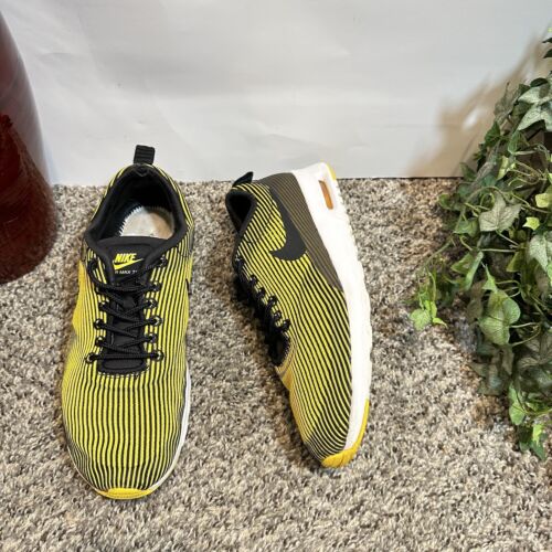 Nike thea yellow new arrivals
