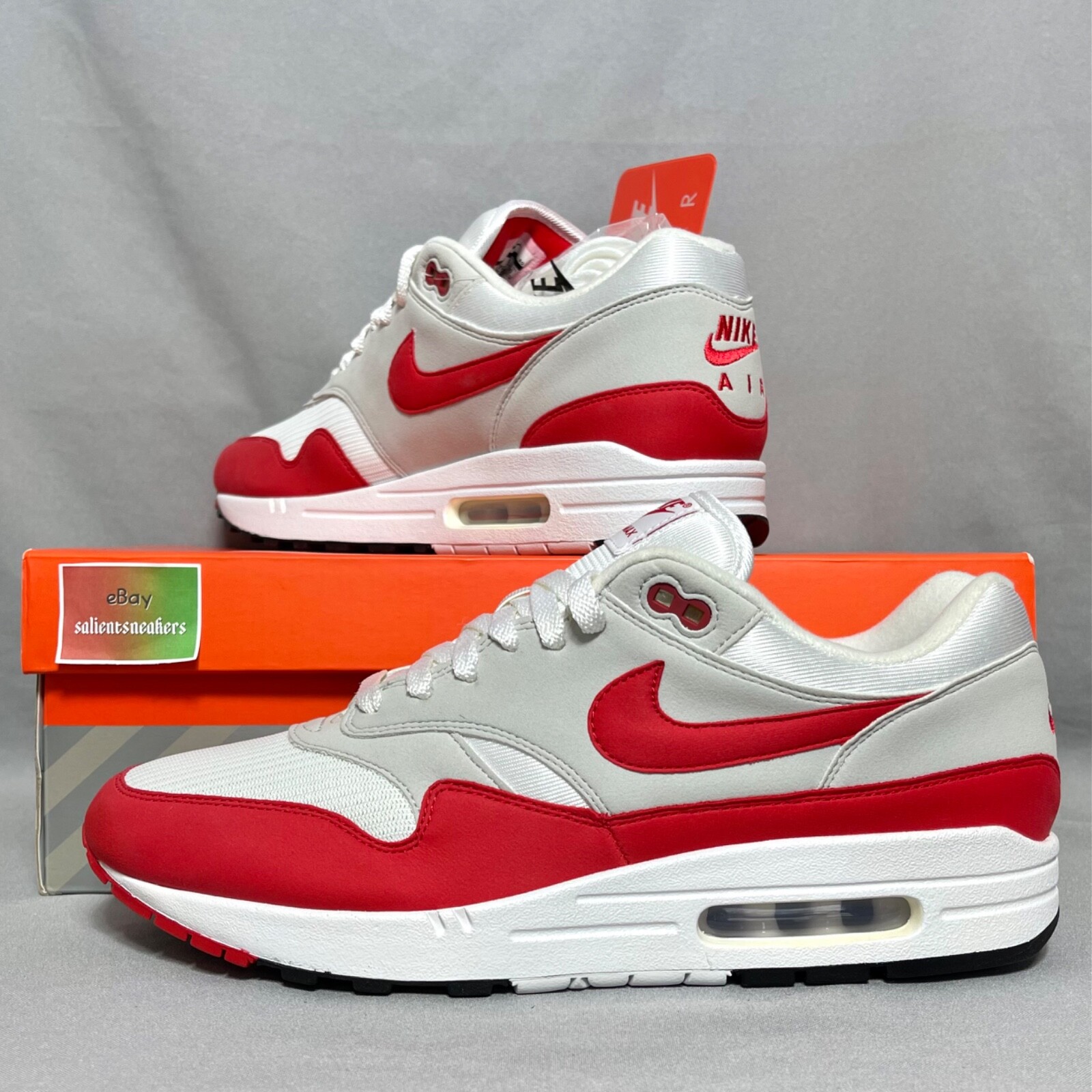 white nike air max with red