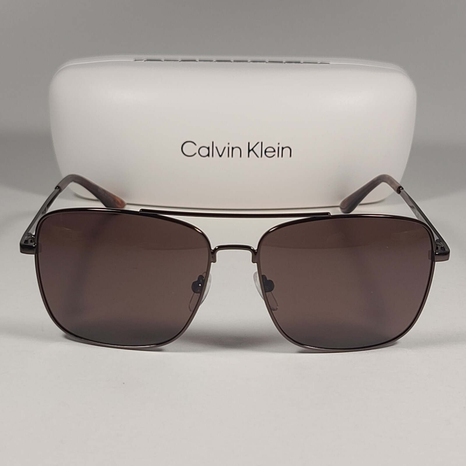 Calvin Klein Navigator Sunglasses CK19136S 200 Brown Frame Calvin Klein Navigator Sunglasses CK19136S 200 Brown Frame