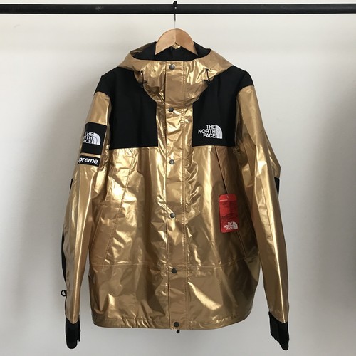 supreme the north face metallic mountain parka gold