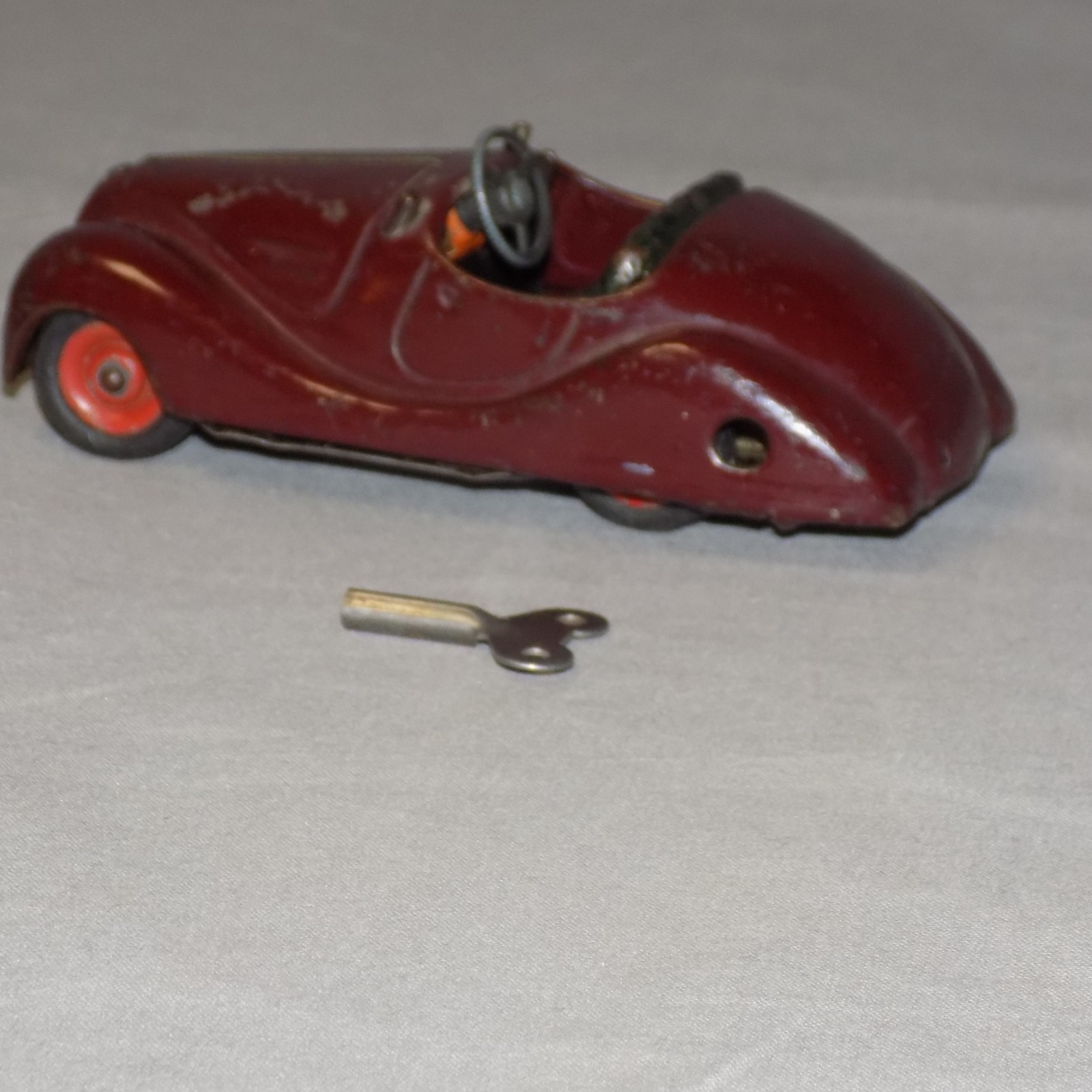 Schuco Burgundy Akustico 2002 in Wind Up car and horn Made in Germany working