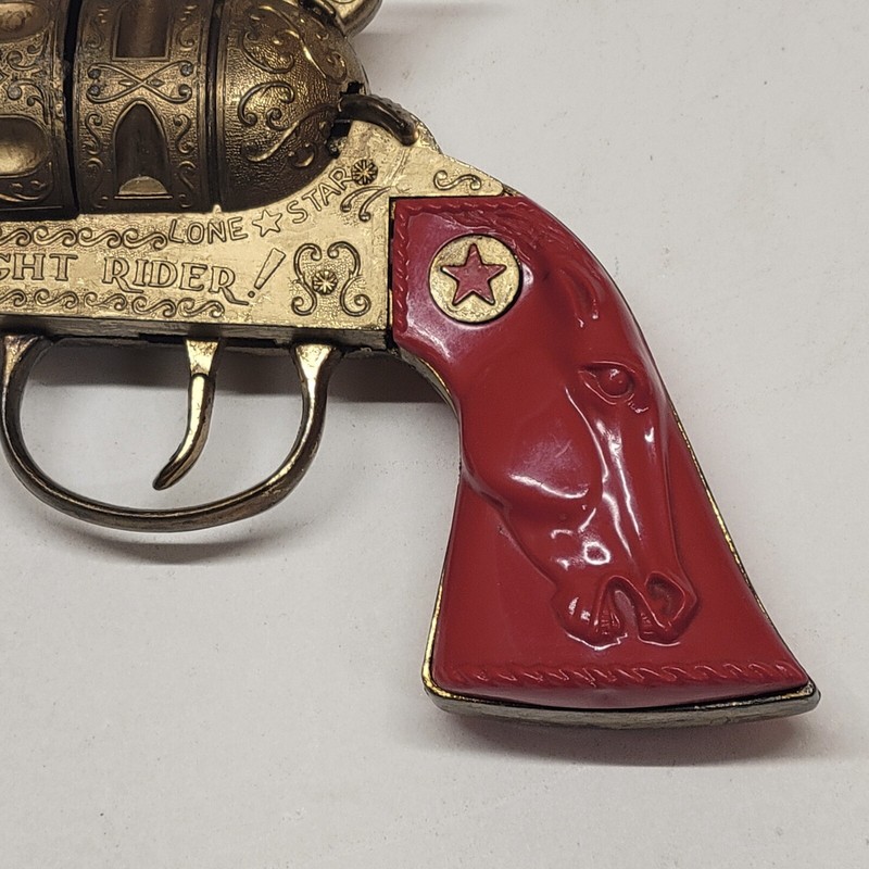 Very Rare Lone Star Night Rider Cap Gun In Gold With Red