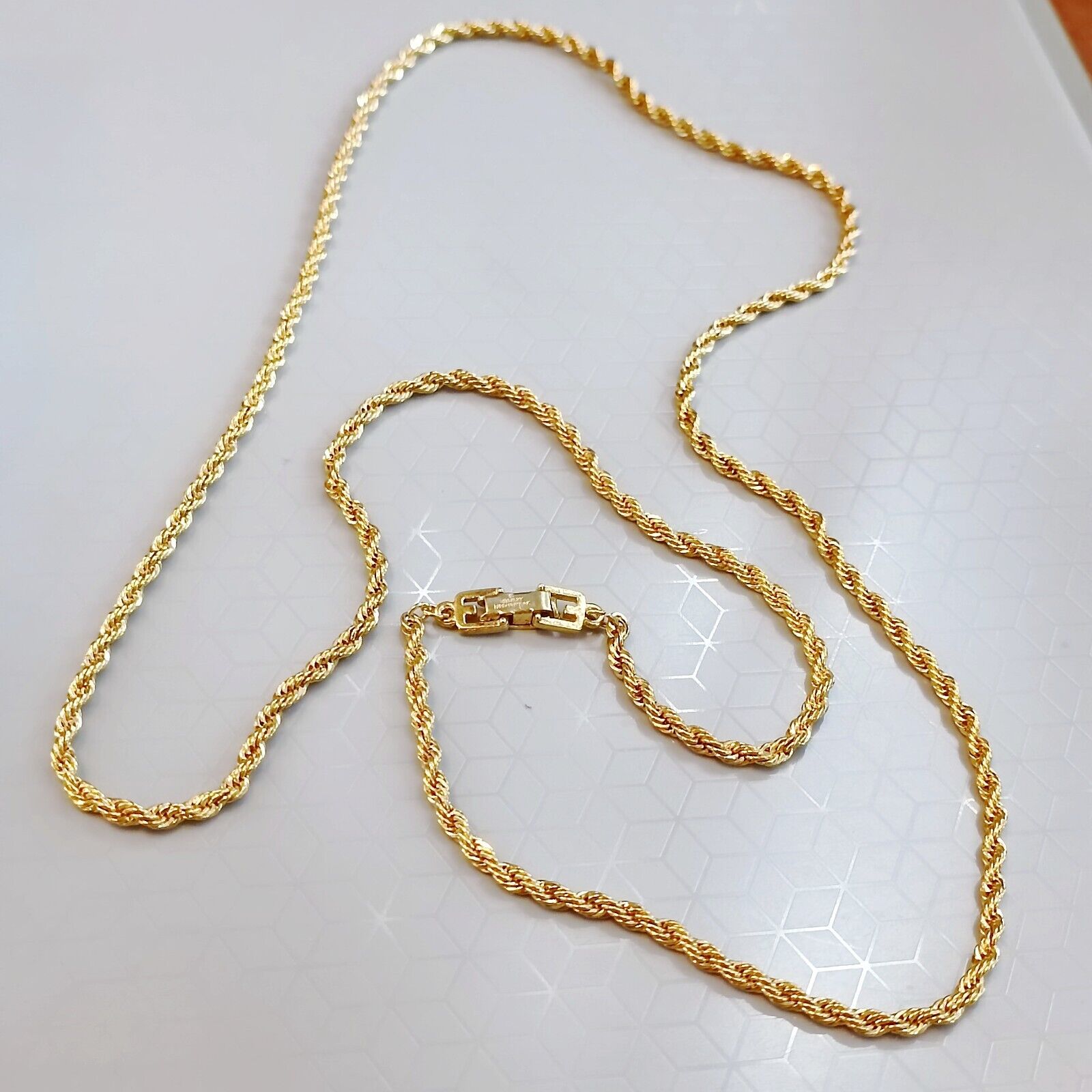 Vintage Givenchy Paris New York Long Gold Tone Twist Necklace Length 29 inch Vintage Givenchy Paris New York Long Gold Tone Twist Necklace Length 29 inch