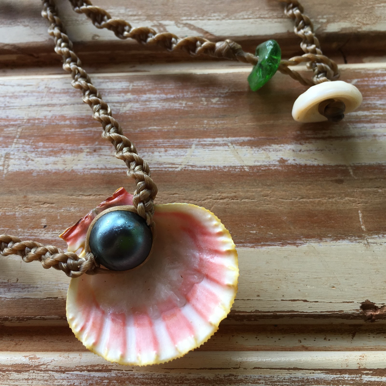Classic Hawaiian sunrise shell necklace with ridge and a touch of gray
