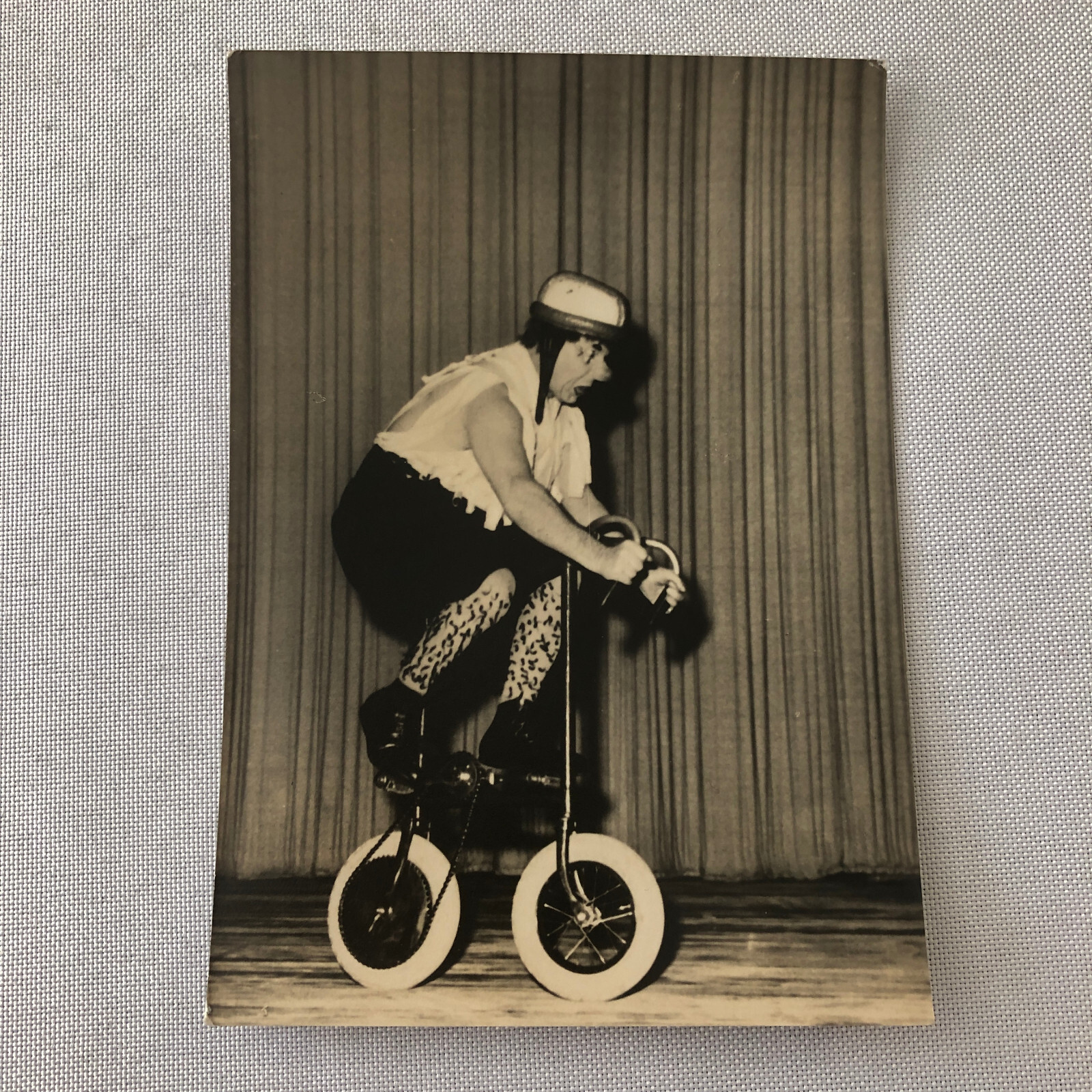 Circus Clown Performer on Mini Bicycle Bike Photograph Photo Berlin Germany