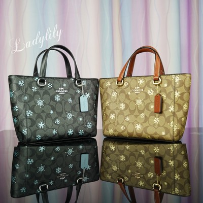 Snowflake coach purse hot sale