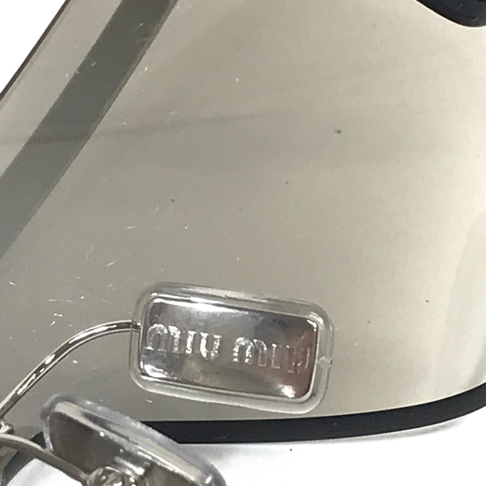 Pre-owned Miu Miu Sunglasses Smu50z 1bc-8k1 Silver Frames With Silver Gray Gradient Lens