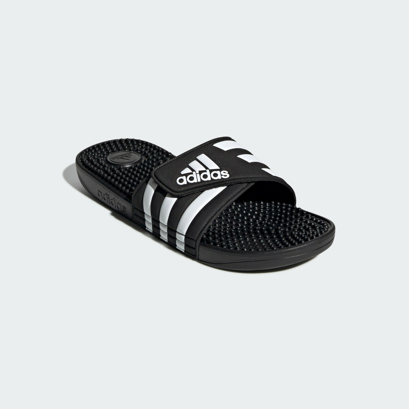 

Сандалии Adidas ADISSAGE унисекс черные/белые F35580 регулируемые шлепанцы, Core black / cloud white / core black, F35580