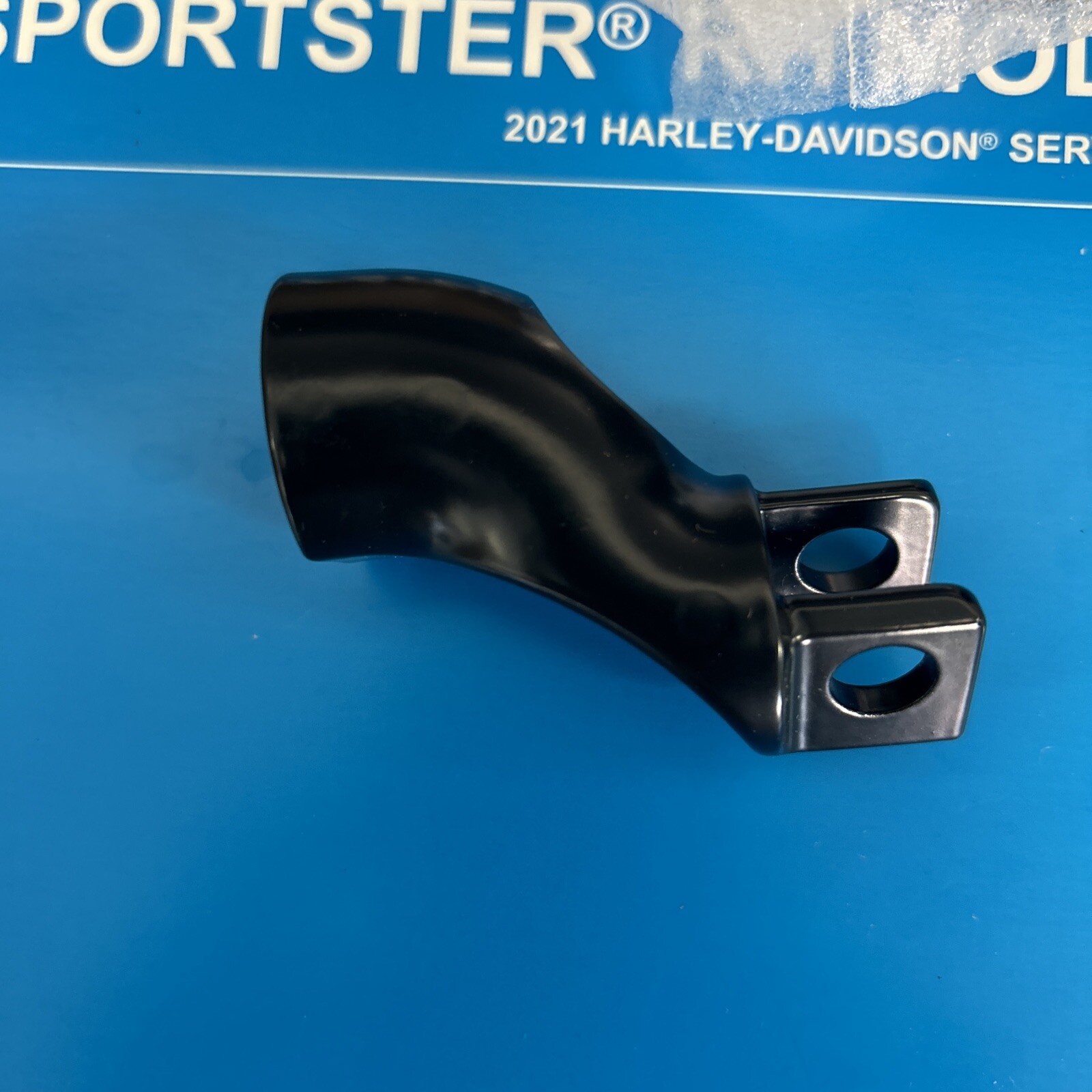 HARLEY-DAVIDSON CLEVIS FOOTPEG RIDER RH. 51089-06BK