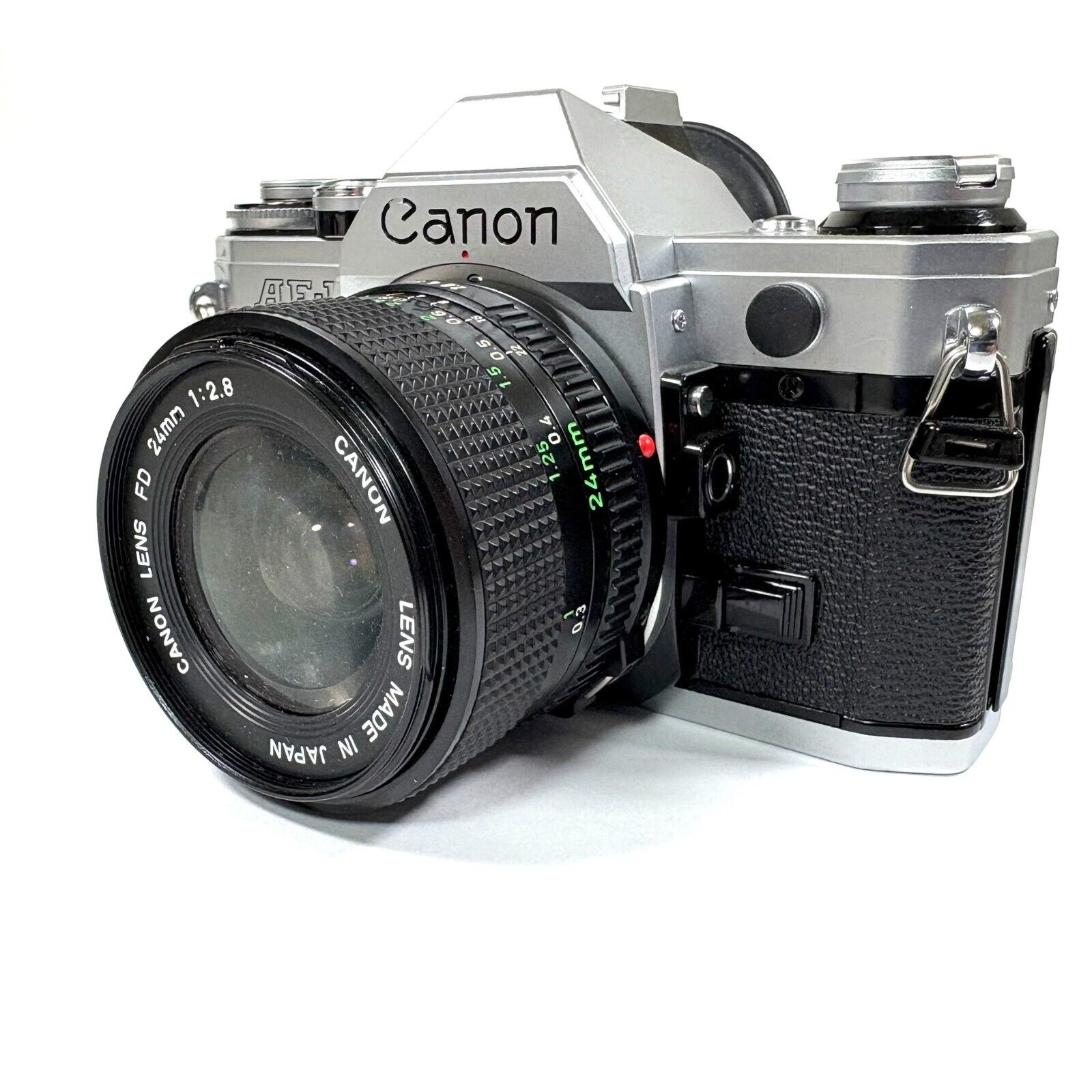 Canon AE-1 35mm SLR Film Camera Silver New FD 24mm F/2.8 Canon AE-1 35mm SLR Film Camera Silver New FD 24mm F/2.8