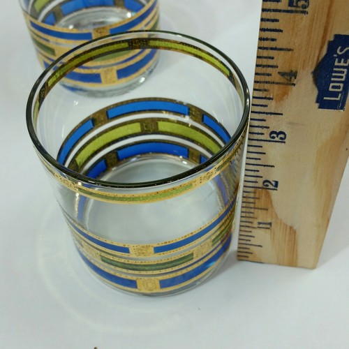 4 VINTAGE MID CENTURY BARWARE  gold blue and green colors