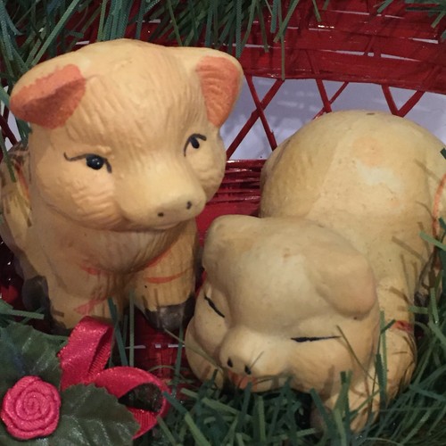 Two Ceramic Pigs in a Wooden Christmas Sled Decor