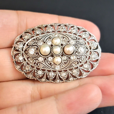Platinum brooch clearance