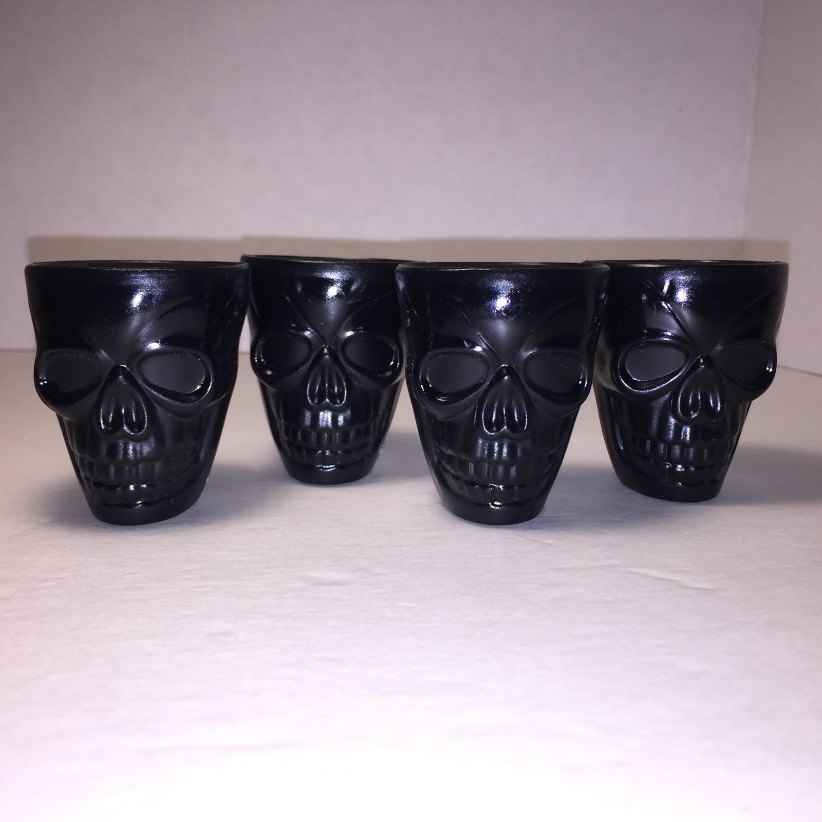 Skull Shot Glasses Smoke Color Plastic Novelty Set of 4 R1