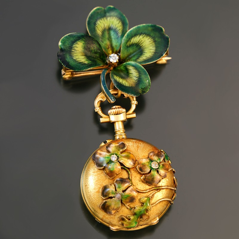 WOMENS GOLD ENAMEL PENDANT WATCH WITH FOUR LEAF CLOVER DESIGN