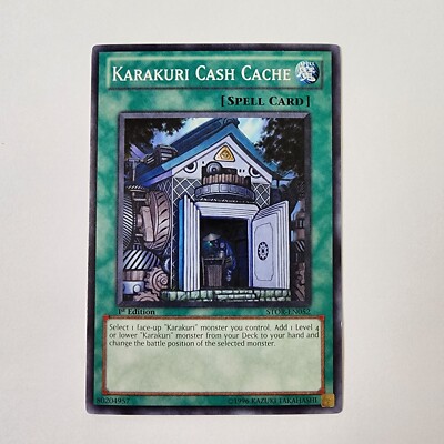 Karakuri Cash Cache - STOR-EN052 - 1st ed - Common - NM  - Yugioh