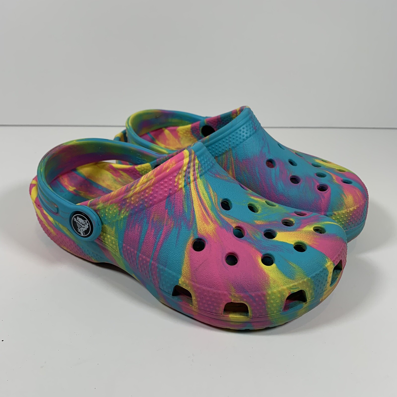 pink yellow blue crocs