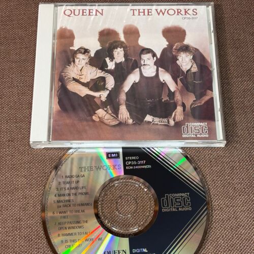 QUEEN The Works JAPAN CD CP35-3117 1A1 TO w/ BOOKLET 1984 issue BLACK TRIANGLE QUEEN The Works JAPAN CD CP35-3117 1A1 TO w/ BOOKLET 1984 issue BLACK TRIANGLE