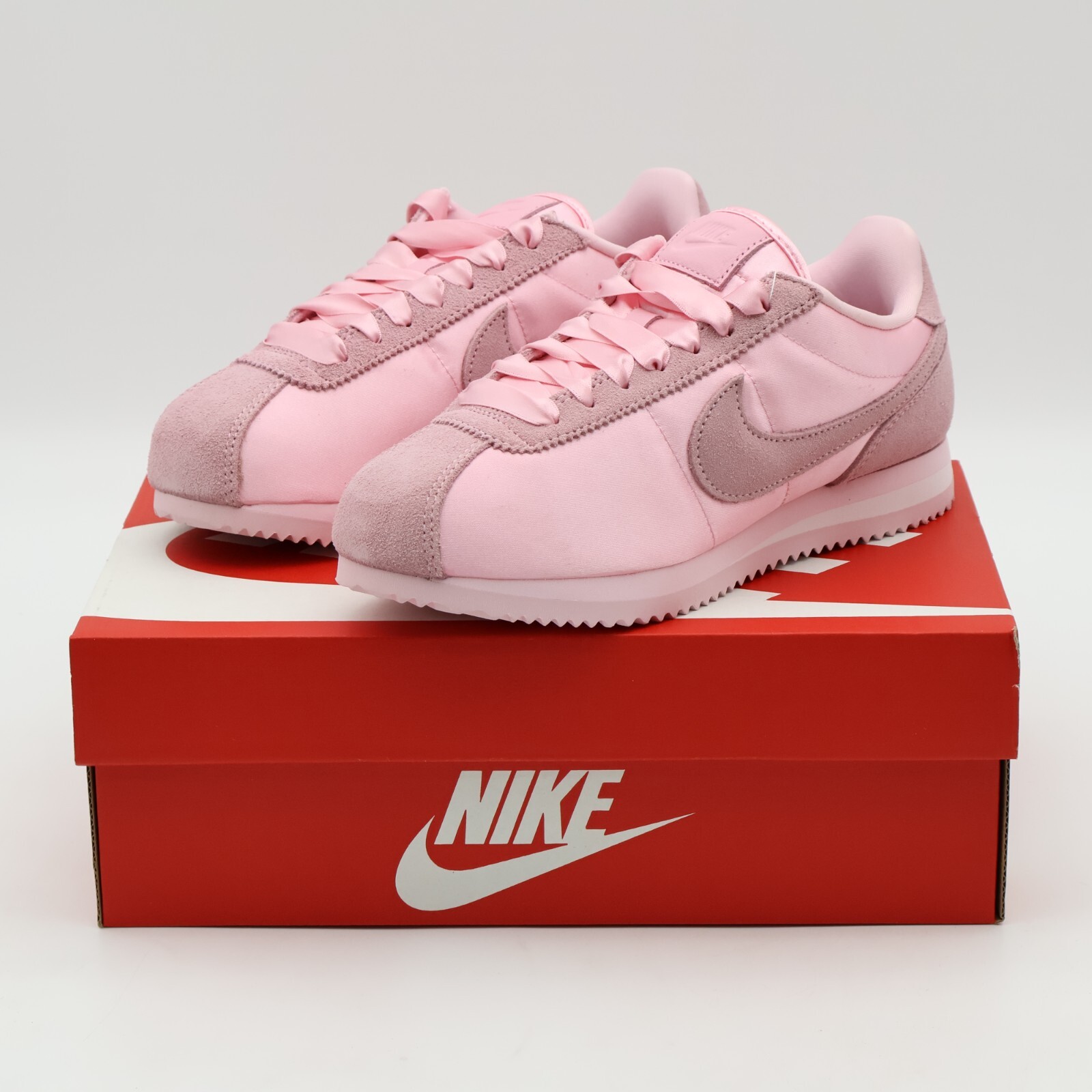nike pink with swoosh suede cortez trainers
