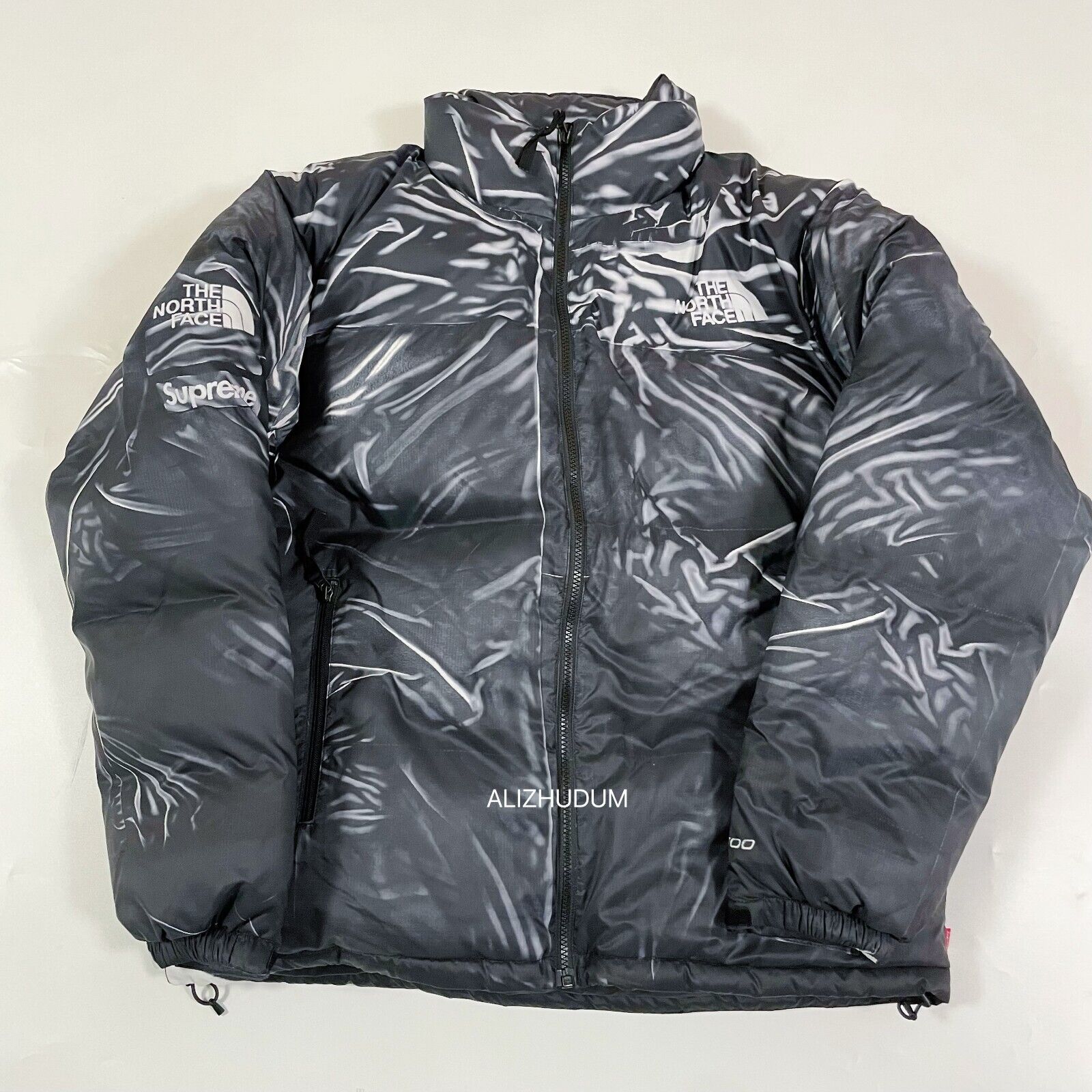 SUPREME SS23 THE NORTH FACE TROMPE L'OEIL PRINTED NUPTSE SUPREME SS23 THE NORTH FACE TROMPE L'OEIL PRINTED NUPTSE