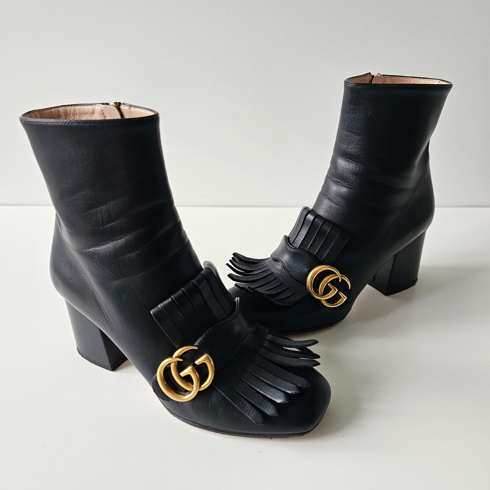 Gucci Marmont Gold GG Logo Black Leather Fringe Ankle Boots