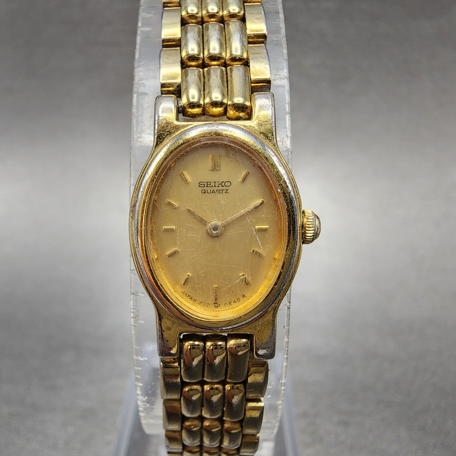 Seiko Watch Women 15mm Gold Dial Gold Tone Oval 1F20-5B90