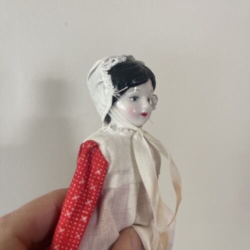 Vintage Silvestri Corp Chicago Porcelain doll 7” Red Vintage Silvestri Corp Chicago Porcelain doll 7” Red